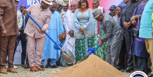 President Joseph Nyuma Boakai Sr. (right) and Julius Maada Bio (left) jointly break ground with ceremonial shovels at the 255-km Western Corridor road project in Liberia. Photo: Executive Mansion